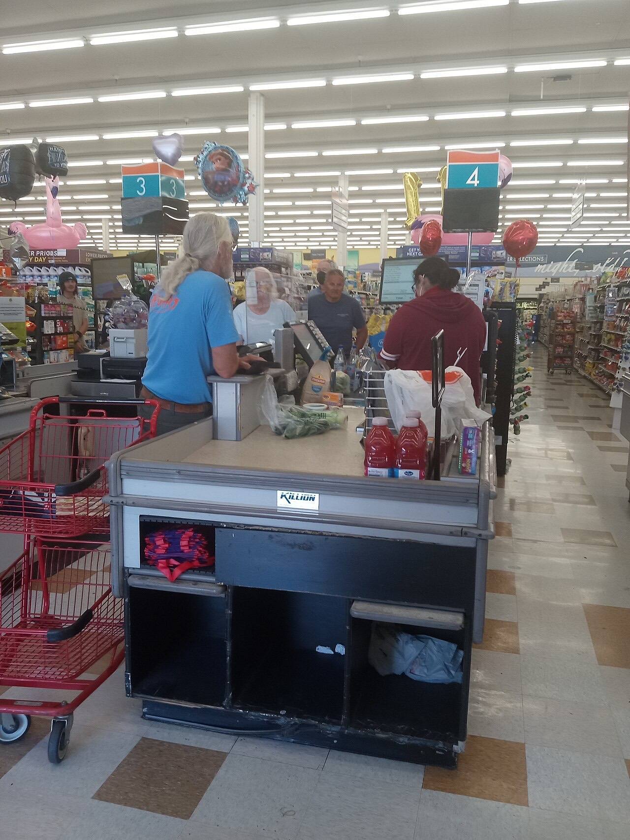 Typical north American store checkout queue.